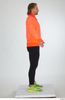  Erling black tracksuit dressed orange long sleeve t shirt sports standing whole body yellow sneakers 0031.jpg